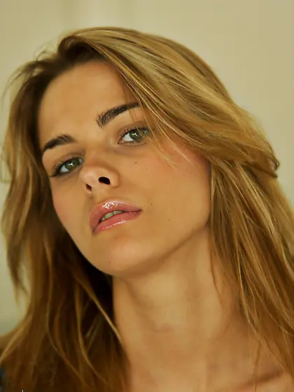 Shy amateur chick Meggan Mallone shows her small tits and smooth