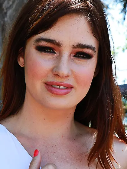 Likable skank with small tits demonstrates superb booty on a bea