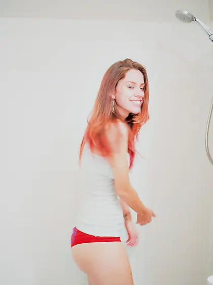 Slender Latina stunner gets wet and reveals her big natural brea