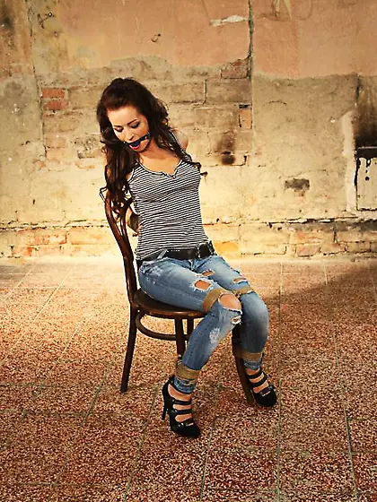 Curly ballgagged red chick