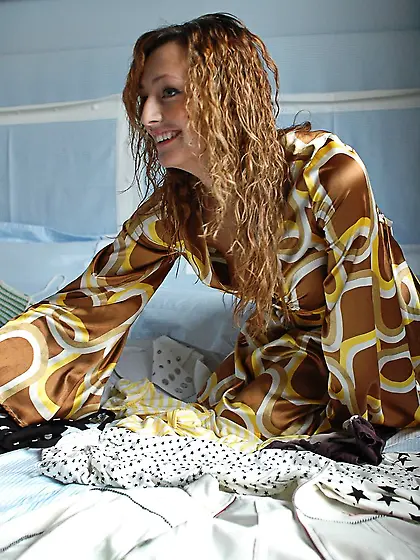 Hot women showing their nude bodies while trying on different cl