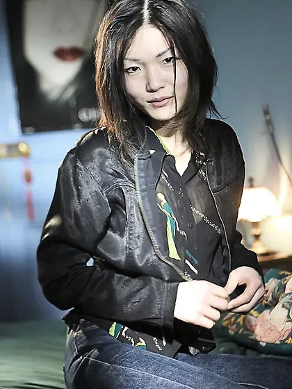 Fantastic Asian badass takes off her jacket and pulls down her p