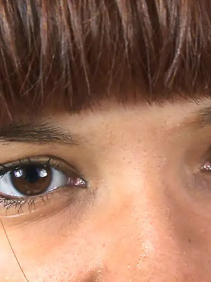 Teen brunette slowly stripteasing