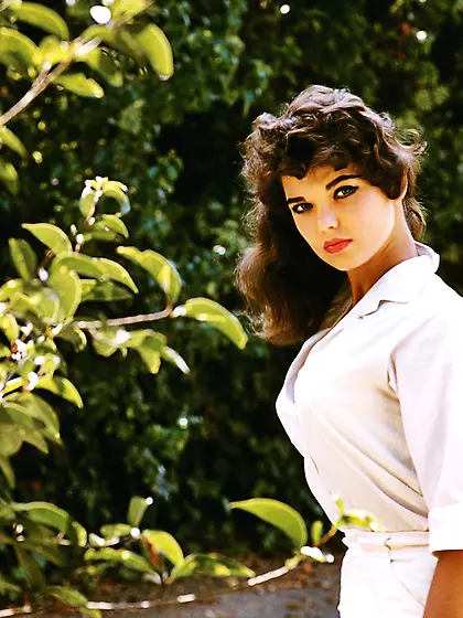 This arousing 60's brunette shows her fine...