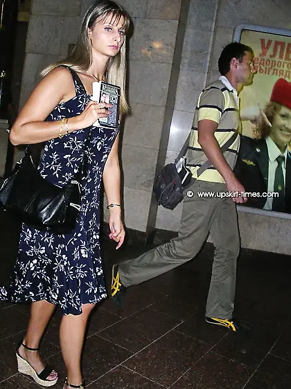 Long-legged babe standing limpid