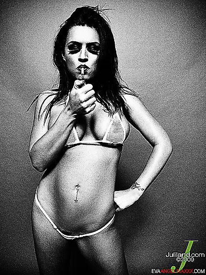 Kinky brunette pornstar Eva Angelina takes an artistic photoshoo