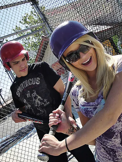 Slutty baseball chick seduces a young man and gets busy with him