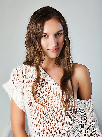 Sassy babe Patsy A is spreading the shaved pussy lips showing of