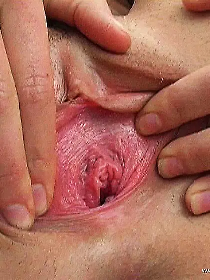 Lora Craft spreads her sexy legs for the camera and then toys he