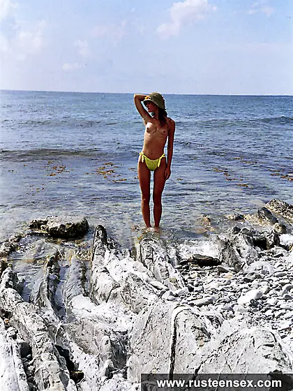 Russian teen posing naked on the cliff