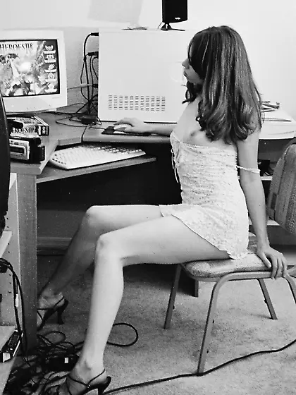 Wide eyed seductress displaying her cooch and looking cute as we