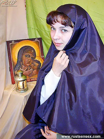 Russian teen nun masturbates with red dildo