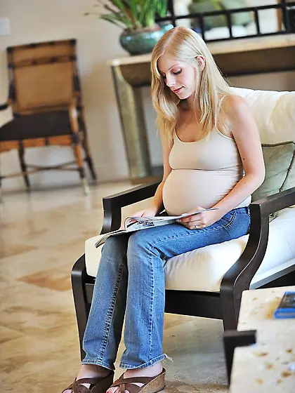 Pregnant blonde babe Laya Leighton bares her tits pinching her b