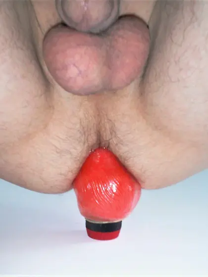 My first red dildo in my ass