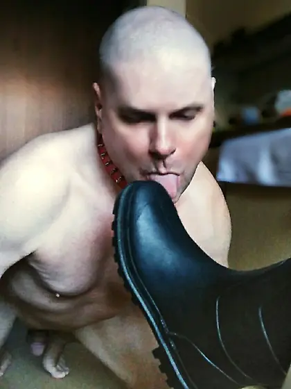 Femdom lady humiliates low boot licking male slave