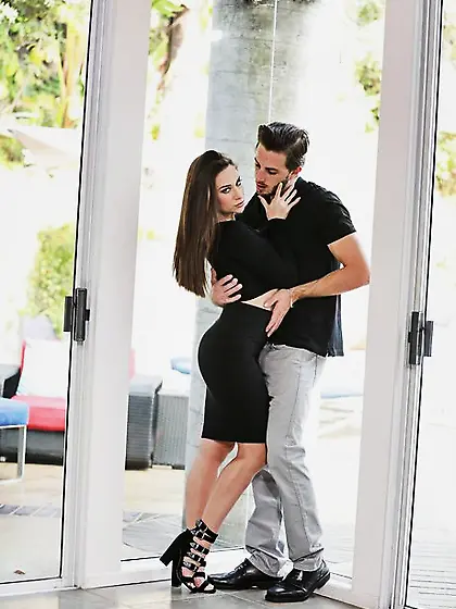 Girl in black tries on different sexy poses and shows off privat