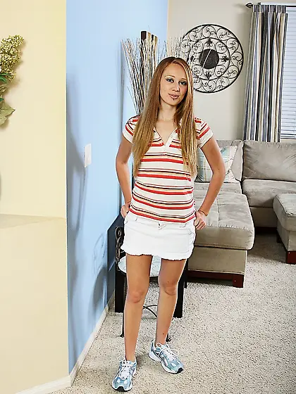 Cori Lynn strips off her orange skin tight panties to show her