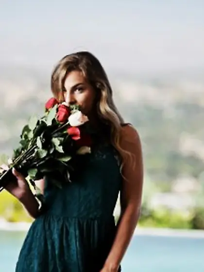 Sultry blonde with a bunch of flowers takes off cute dress when