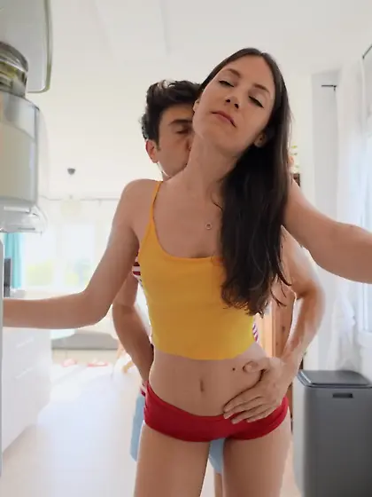 Young housewife with natural tits pleases her man in the kitchen