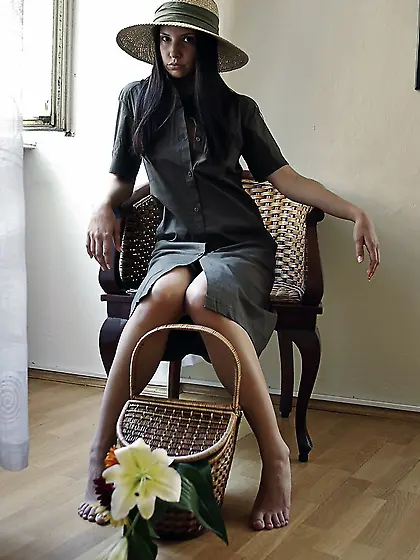 Smoking hot brunette babe Monika Vesela strips in the living roo