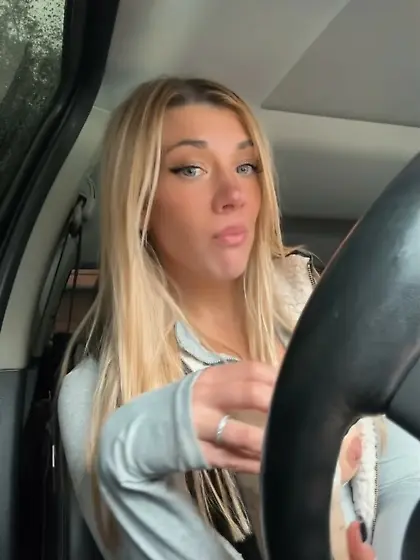 Slut showing nipple in the car