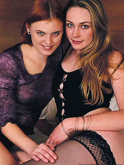 Foxy redhead purple blouse