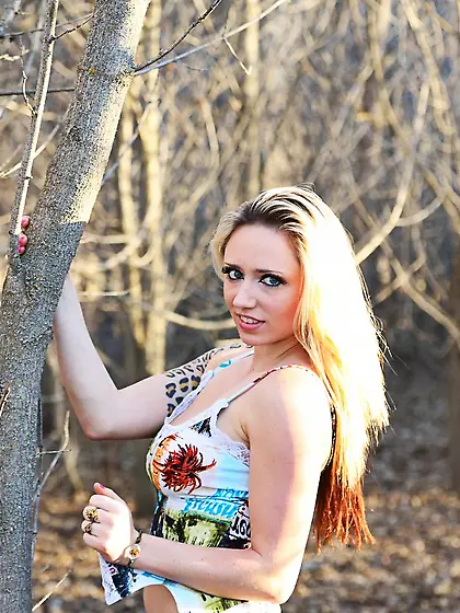 Nasty girl with blond hair Lily Xo has bared off her boobs and s