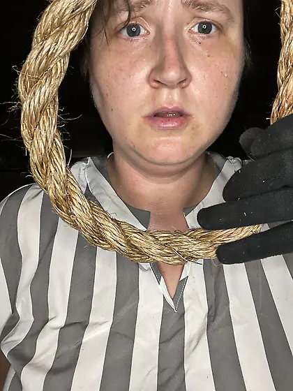 Executioner noosing me