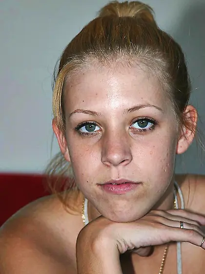 Pink pussy girl Leah Luv strips off her barely there black strin