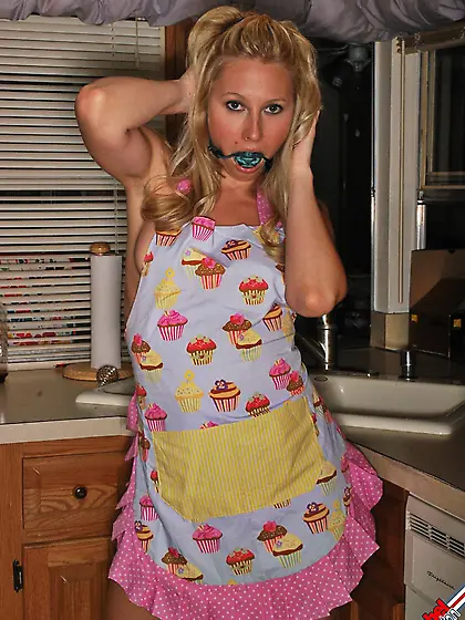 Gagged bimbo Rachel Sexton is fooling around in dress and half n