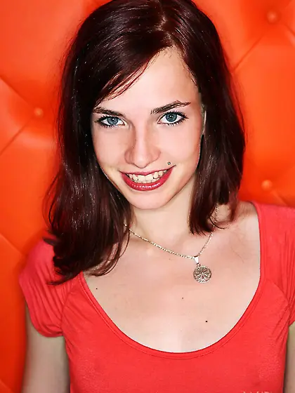 Smiling and slowly stripping. That is what Leila Smith loves the