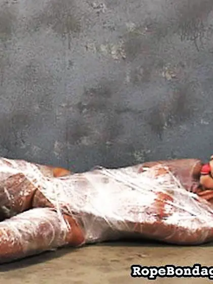 Wrapped gagged bitch dildoing