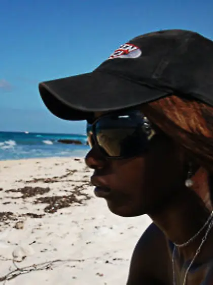 Small-assed black slut with tiny titties gets naked on the rocky