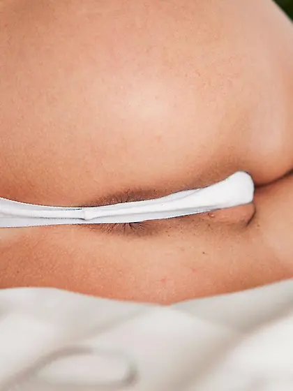 Hot brunette Monika Benz is wearing tiny white thong and sexily