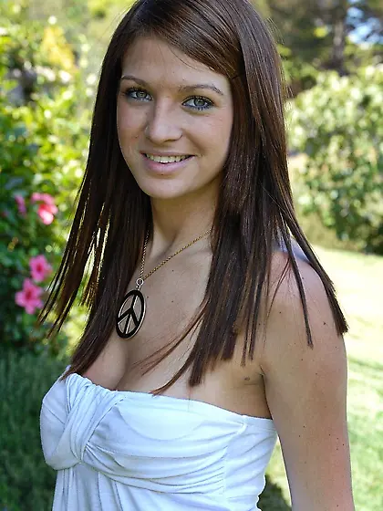 Brunette girl Gabby FTV loses her white dress and makes red toy