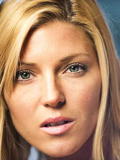 Blonde in pink pinching her nipples and showcasing that perky bu