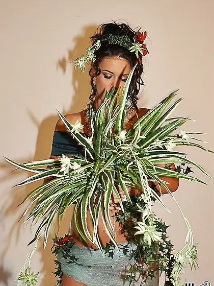 Beautiful kinky brunette Faith Adams slowly strips and shows her