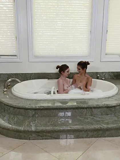 Long-haired naughty girls bath