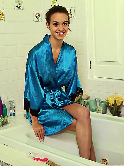 Smiling teen shoves huge