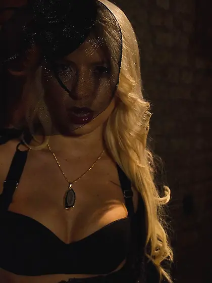 Ravishing vampire sneaks in darkened cellar to show juicy boobs