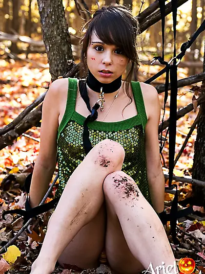 Sexy solo girl,  Ariel Rebel posing in the forrest and shows her