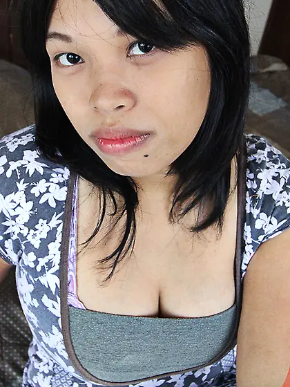 Tight vagina of Asian chick with a mole on chin is drilled and f