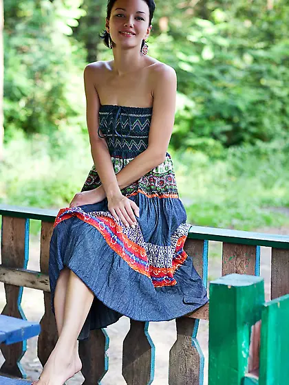 Lovely and cheerful brunette Loreen A takes off her dress outsid