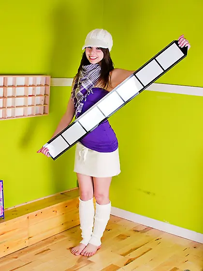 Ariel Rebel posing in her sexy purple dress and shows her nasty