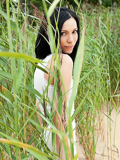 Brunette teaser Lily Nubiles demonstrates her perky boobs and sh