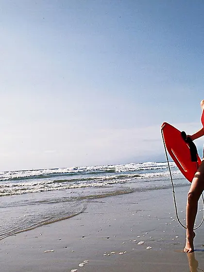 Pretty blond lifeguard strips