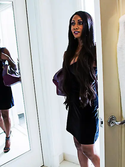 Black chippy Diamond Jackson keeps her stockings legs opened for