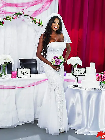 Ebony seductress in a wedding dress gets fucked by a hung white