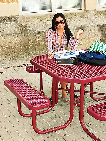 Attractive brunette Cierra Spice with sexy long legs posing in w