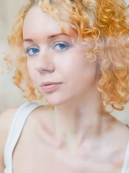 Curly red-haired teeny gets wet in the shower and teases with he